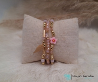 Armband elastisch met glasbeads, roze/goud.